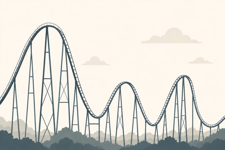 An empty rollercoaster track against a pale sky, illustrating the ups and downs of learning to budget on commission income.